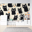 Modern Cat Wallpaper with black felines and orange leaves displayed in a bright Scandinavian living room setting