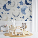 Blue celestial mural transforming a peaceful reading nook