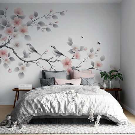 Cherry blossom wallpaper with birds creating a peaceful atmosphere in a bright master bedroom with minimal furniture
