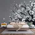 Black and white Cherry Blossom Wallpaper creating a peaceful atmosphere in a modern minimalist living room setting