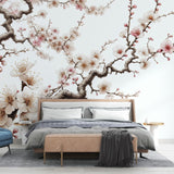 Cherry blossom wallpaper mural creating a peaceful atmosphere in a modern bedroom with natural light