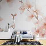Cherry blossom wallpaper creating a peaceful atmosphere in a modern bedroom with natural light