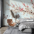 Cherry blossom wallpaper creating a peaceful sanctuary in a modern bedroom, pink sakura flowers with butterflies on light walls