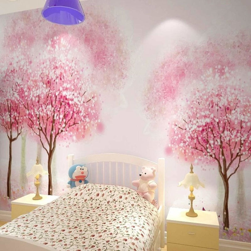 Cherry blossom wall mural creating a peaceful atmosphere in a modern living room with white furniture