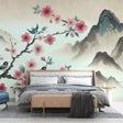 Japanese Cherry Blossom Wallpaper bringing zen vibes to a modern living room with mountain landscape and birds