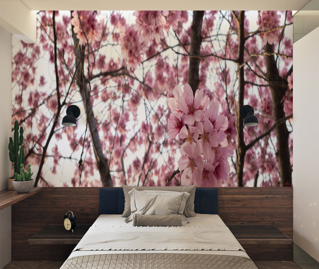 Japanese cherry blossom mural in a minimalist living room setting with natural light