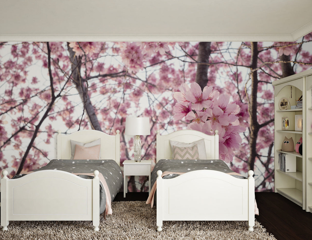 Cherry blossom wall mural creating depth in a dining room with modern furniture