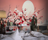 Cherry blossom wallpaper creating a serene atmosphere in a modern living room with minimalist furniture