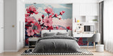 Cherry blossom wallpaper mural creating a peaceful atmosphere in a modern living room with minimalist furniture