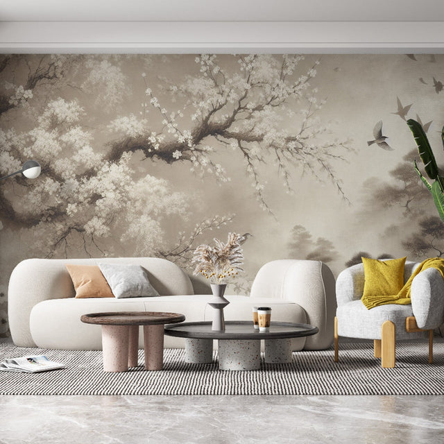 Cherry blossom wall mural creates a serene atmosphere in a modern bedroom with soft lighting and minimal furniture
