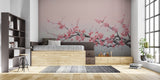 Pink sakura wall mural adding spring charm to a minimalist bedroom