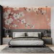 Cherry blossom wallpaper creating a serene atmosphere in a modern living room with terracotta accents
