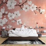 Japanese floral wall mural brightening a cozy bedroom with soft morning light