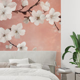 Terracotta cherry blossom mural adding warmth to a peaceful home office space