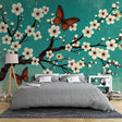 Cherry blossom wallpaper in modern bedroom showing turquoise and white sakura design with floating butterflies