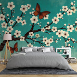 Cherry blossom wallpaper in modern bedroom showing turquoise and white sakura design with floating butterflies