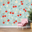 Cherry blossom wallpaper mural creating a fresh garden feel in a bright modern kitchen with white cabinets
