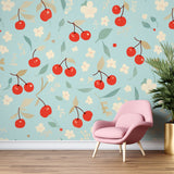 Cherry blossom wallpaper mural creating a fresh garden feel in a bright modern kitchen with white cabinets