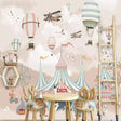 Circus theme wallpaper brings magic to a bright nursery, with soft pastel hot air balloons floating above vintage fairground tents