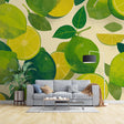 Lime fruit wallpaper bringing fresh energy to a modern white kitchen, green accents popping against cream walls