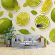 Lime pattern wallpaper brightening a modern white kitchen with pendant lights and wooden countertops