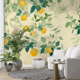 Mediterranean lemon tree wallpaper creating a bright, welcoming atmosphere in a modern white kitchen with marble countertops