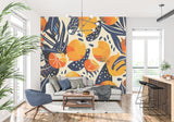 Modern citrus fruit wallpaper bringing fresh energy to a bright kitchen with white cabinets