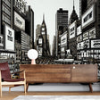 Manhattan comic style wallpaper creating depth in a modern home office, black and white urban design with yellow accents