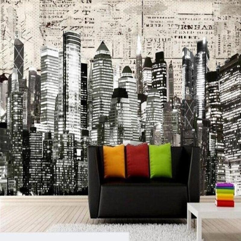 Urban wall mural in contemporary home office showing black and white skyscrapers design with clean workspace setup