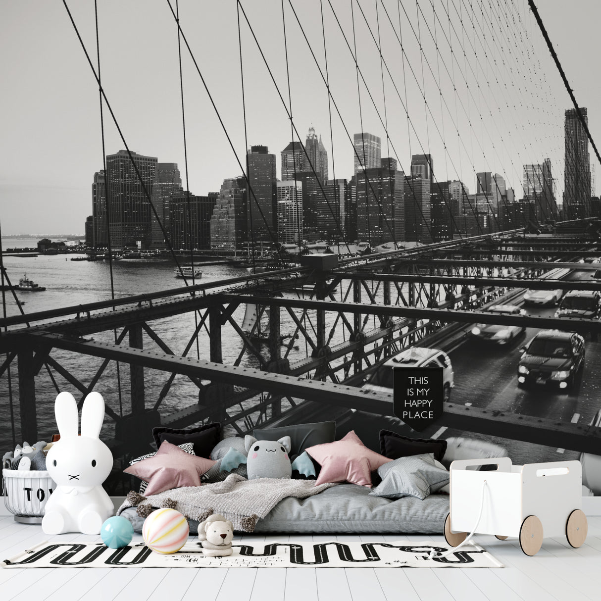 Black and white city mural of Brooklyn Bridge installed in industrial style dining room