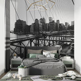 NYC bridge wallpaper creating focal point in modern bedroom setting