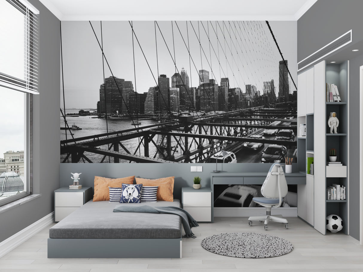 Monochrome Brooklyn Bridge mural wallpaper in urban loft apartment