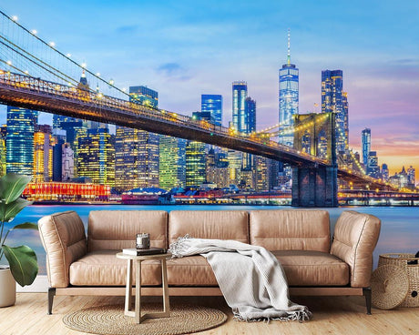 Brooklyn Bridge night skyline mural in modern living room with grey sofa
