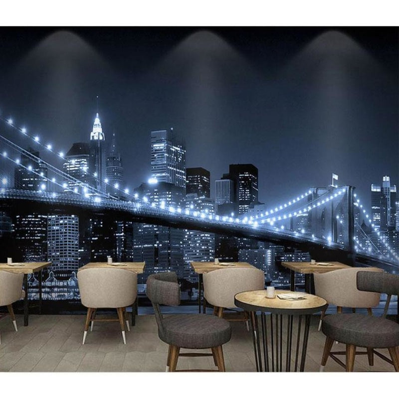 New York city mural creating depth in minimalist dining room with pendant lights