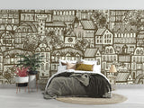 City line art wallpaper creating depth in cozy home office with natural lighting
