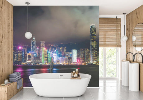Hong Kong night skyline wallpaper mural in modern living room, city lights reflecting on dark walls