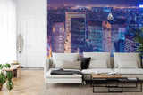 Manhattan skyline wallpaper creating depth in modern living room with grey sofa and minimal decor