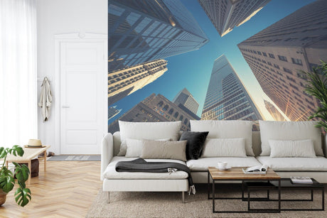 Modern skyscraper wallpaper shown in minimalist home office with white desk and black chair