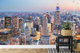 Manhattan sunset mural wallpaper transforms home office with panoramic city views