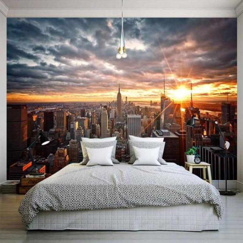 New York skyline wallpaper mural creating drama in modern living room with grey sofa and floor-to-ceiling installation