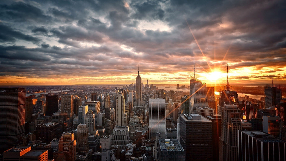 New York City sunset skyline design file showing detailed panoramic view with golden sky and silhouetted buildings