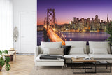 San Francisco Bridge wall mural creating depth in modern living room with warm sunset tones