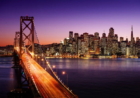 San Francisco Bridge sunset design file showing rich purple-orange gradient and city lights