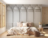 Elegant white molding wallpaper in a bright living room, showing architectural details and depth
