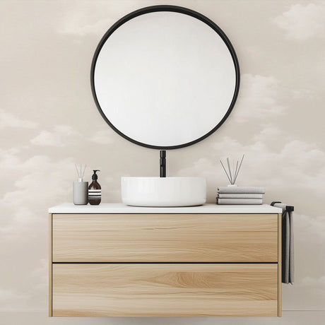 Cloud mural wallpaper creating a peaceful atmosphere in a modern bedroom with natural light and minimal furniture