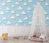 Blue sky wallpaper brightening a children's playroom with natural light