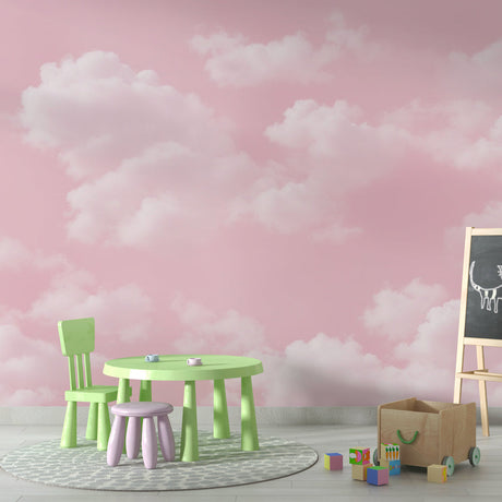Pink cloud wallpaper mural creating a soft, dreamy atmosphere in a modern bedroom with white furniture