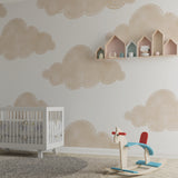 Cloud nursery wallpaper creating a soft atmosphere in a modern baby room with wooden crib