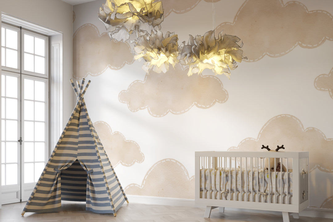 Cloud pattern wallpaper bringing warmth to a neutral nursery design