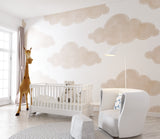Baby room cloud wallpaper in a minimalist nursery setup
